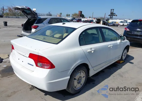 2007 Honda Civic Hybrid from USA, damaged, VIN JHMFA36297S017183